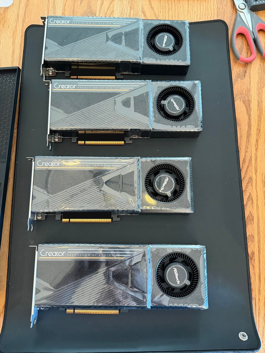 Our four ASRock Creator R9700 cards side by side before installation